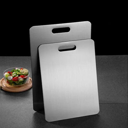 Double-sided Stainless Steel Cutting Board Food Grade Commercial Thickened Mildew Resistant Domestic Fruit Cutting Board - ROYAL TRENDS Elevate your food preparation with our Double-sided Stainless Steel Cutting Board. Crafted from food grade stainless steel, this commercial-grade board is thicker and more resistant to mildew. With double-sided usability and a sleek design, keep your kitchen clean and your food safe. 